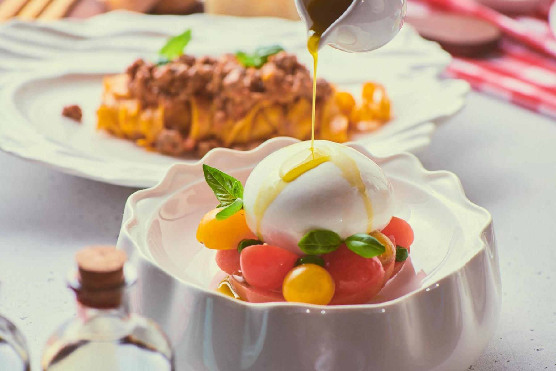 Five Jumeirah Village 두바이 외부 사진 A salad being drizzled with olive oil